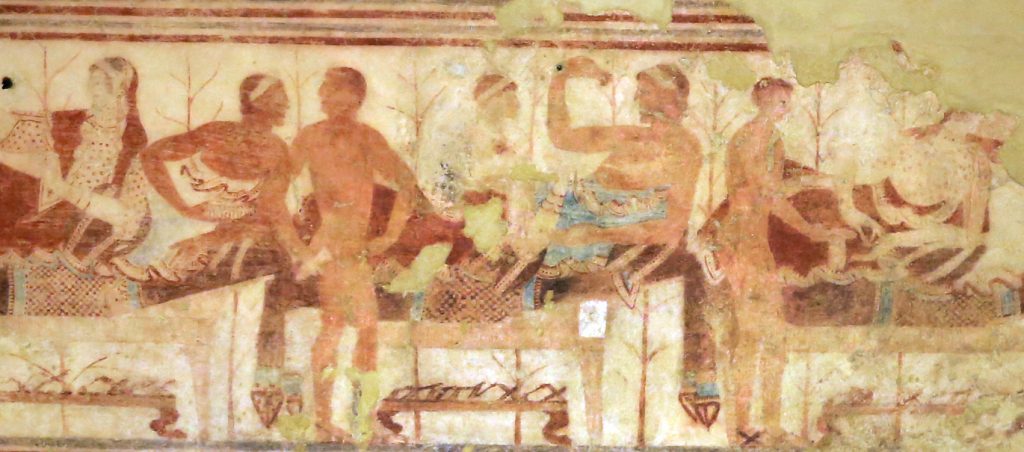 Een typische banketscène uit de Tomba della Nave: de slaven zijn weliswaar naakt, maar de vrouwen kunnen bezwaarlijk losbandig genoemd worden